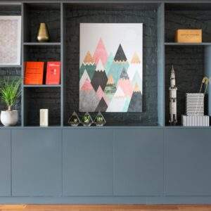 black wooden shelf with green plants